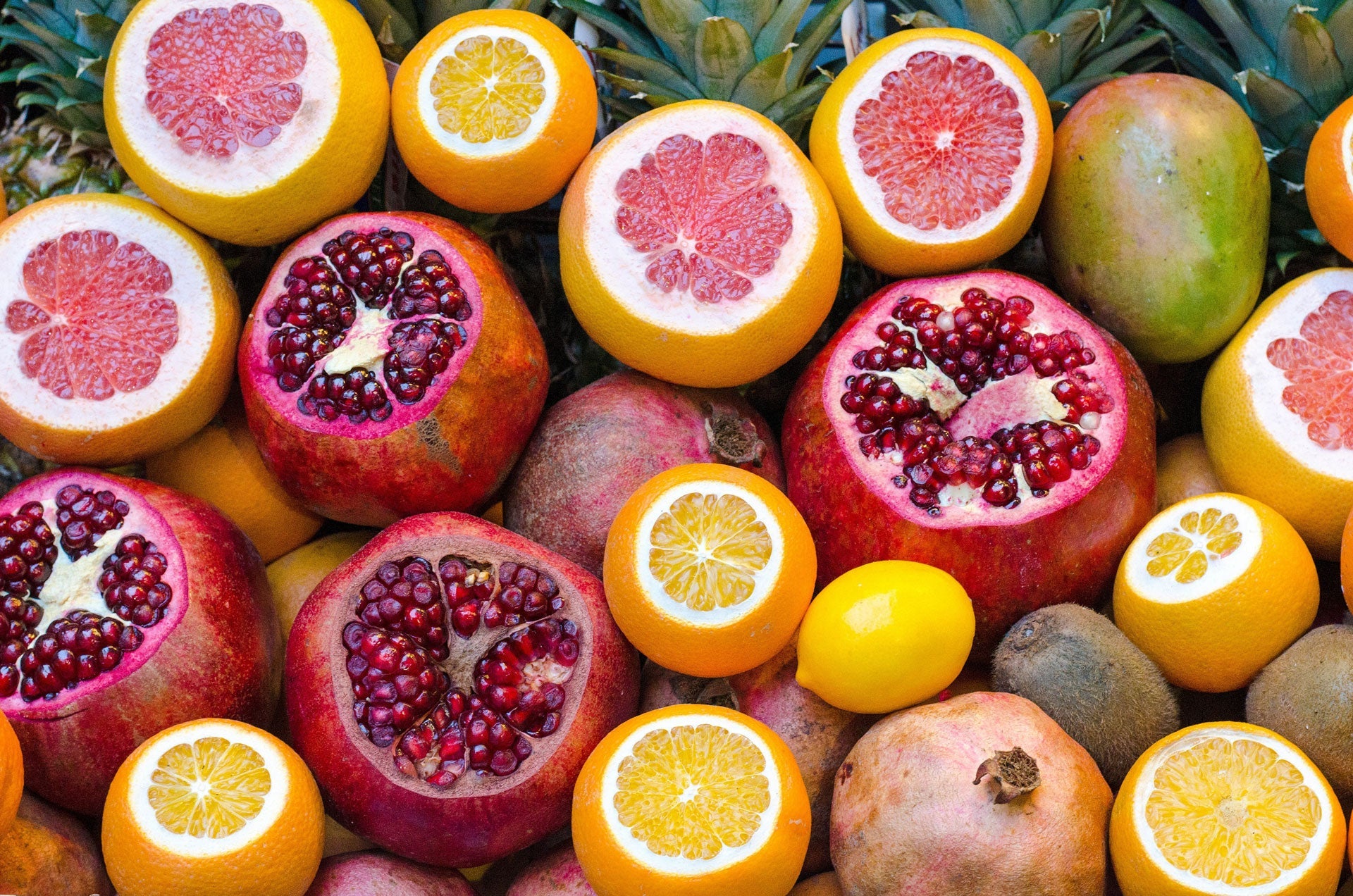 Cut citrus and pomegranates